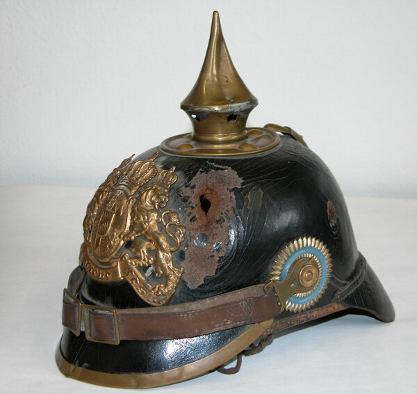 Simon Gammel’s Pickelhaube with the shrapnel hole in front. 